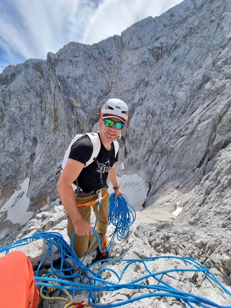 Markus Schubert climbing in alpine terrain.